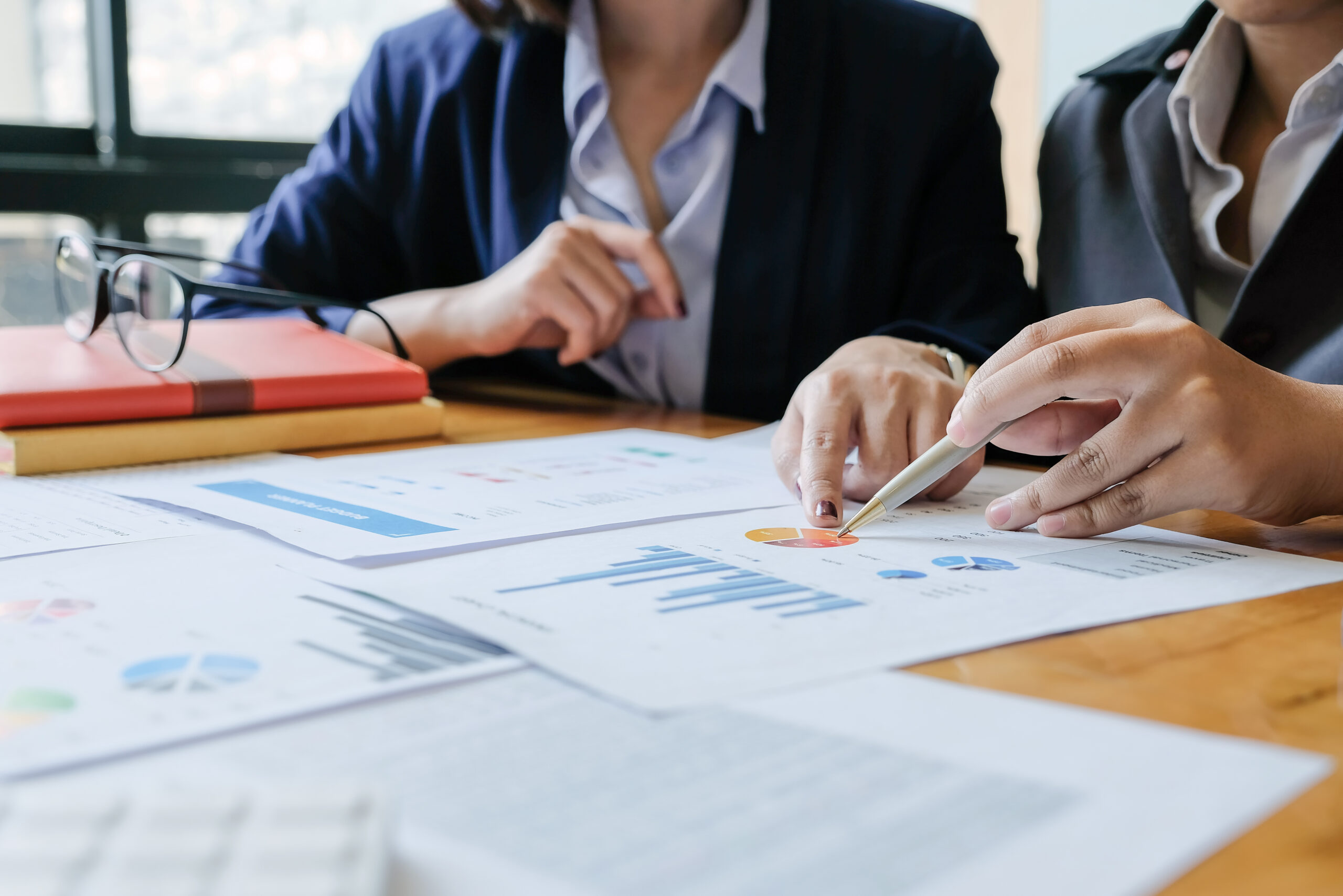 two business people reviewing financials